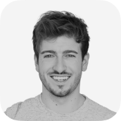 A picture of Shaun with a rainbow background.